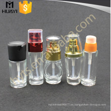 Botella de cristal cosmética coloreada decorativa al por mayor de la loción de 30ml 50ml con la bomba